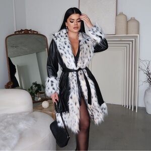 Faux leather coat with white fur trim